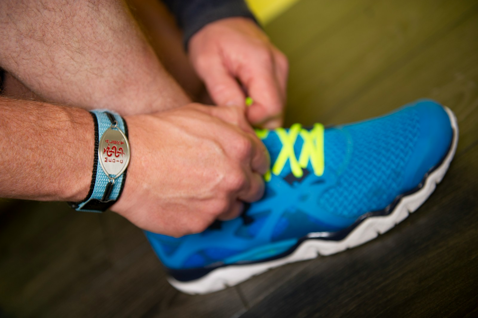 blue and white nike athletic shoe